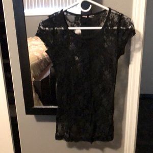 Gorgeous short sleeve see through. Fitted and it’s nice and long. Beautiful.